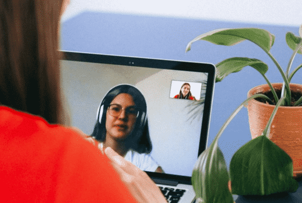 Two women video conferencing